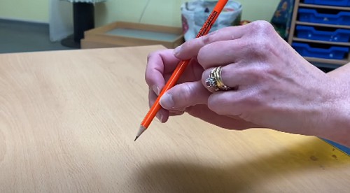 holding-a-pen